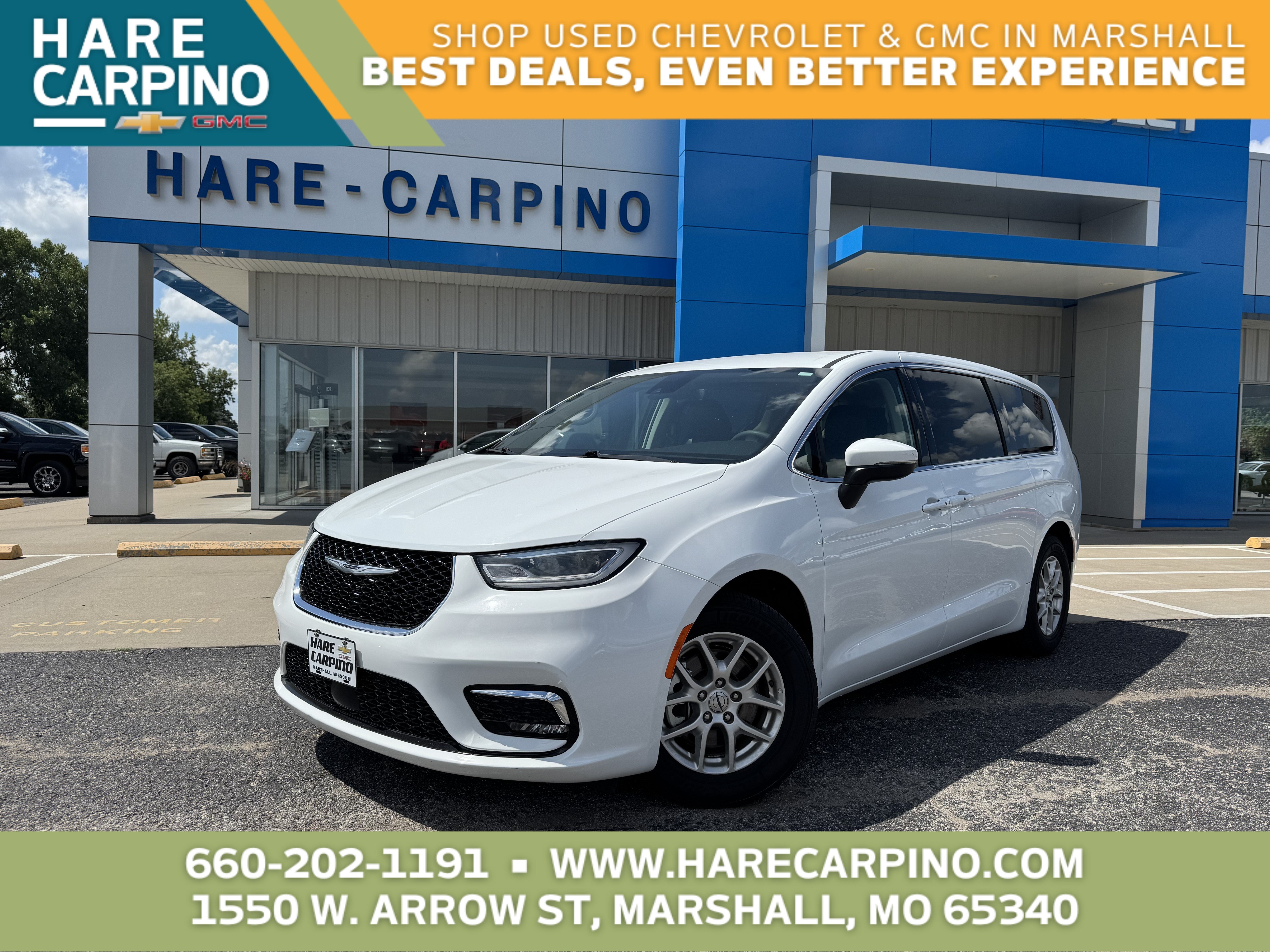 2023 Chrysler Pacifica Touring L in White — front three-quarter view